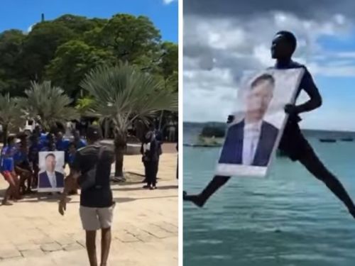 VIDEO Momentul în care un bărbat din Tanzania se aruncă în apă cu tabloul lui Klaus Iohannis